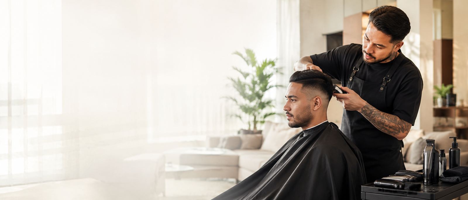 Barber giving a personalized haircut during a house call